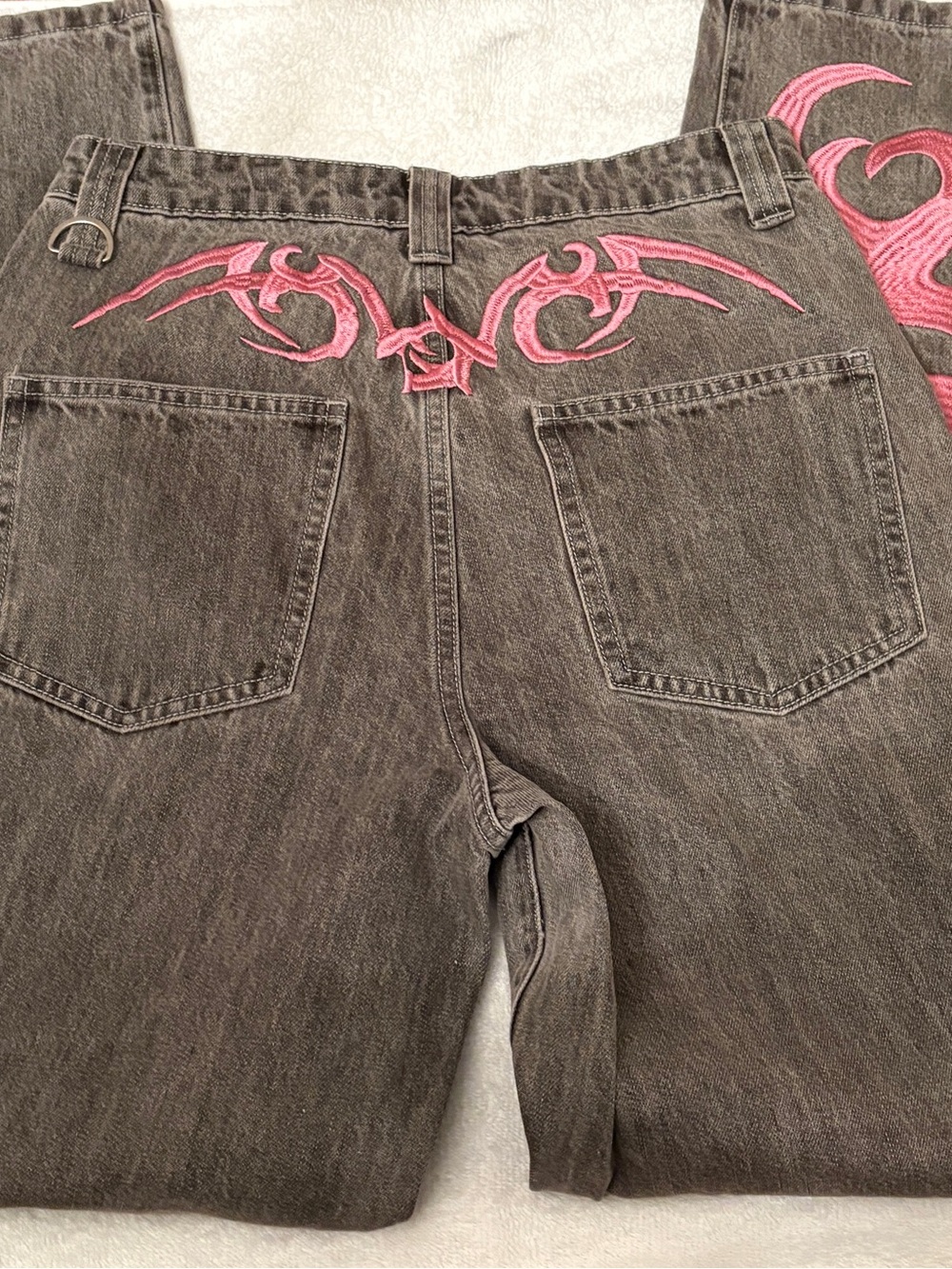 dELiA*s Black Denim Overalls with Pink Embroidered Back Detail